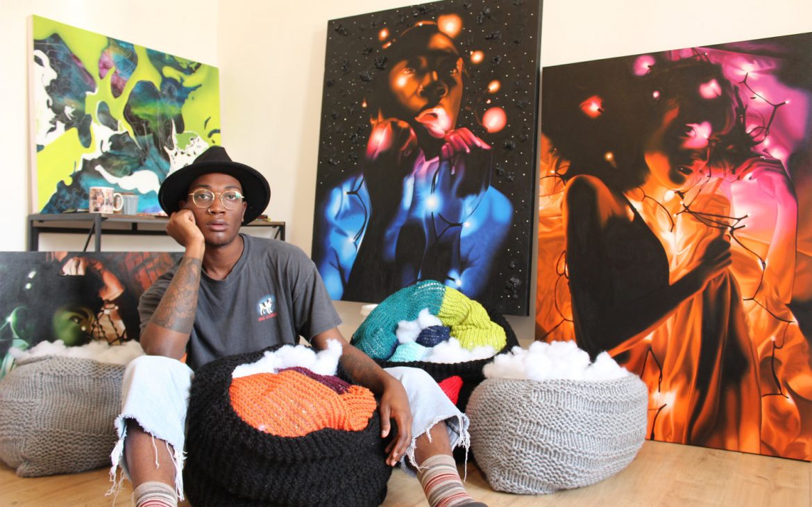A group of people sitting around a bunch of stuffed animals